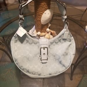 Coach light blue purse new never used with tag